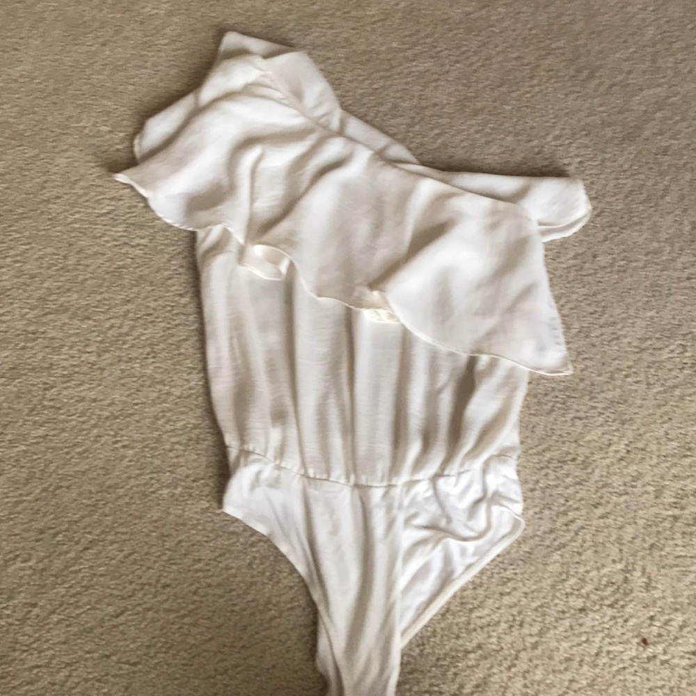 A onesie asymmetrical silk top